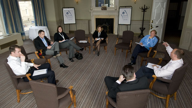 Photocomedia captures an informal discussion between delegates